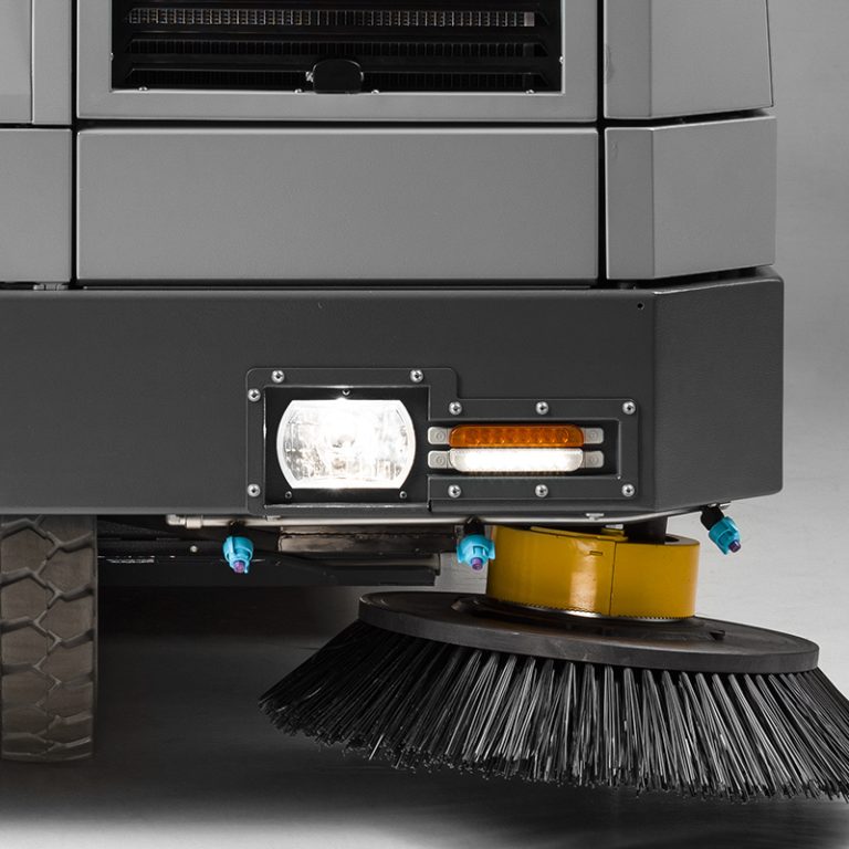 Wet side brush dust control